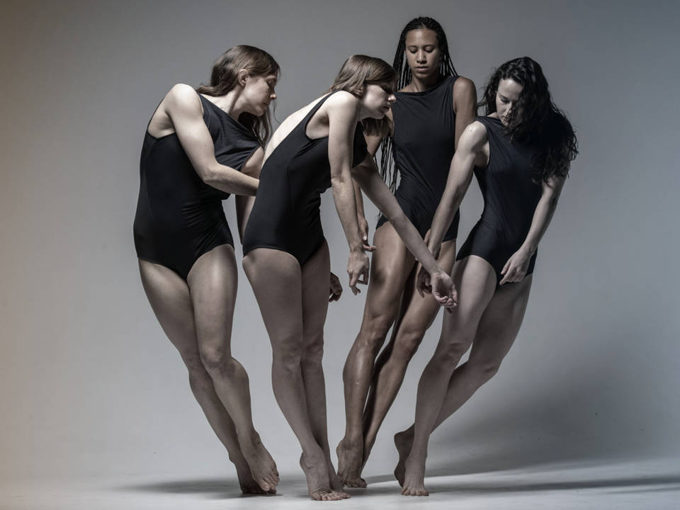 Image of four push/FOLD dancers in leotards.